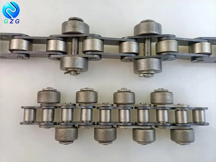 Transportörkedja med utombordsrulle